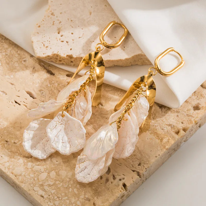 Aretes Concha del mar
