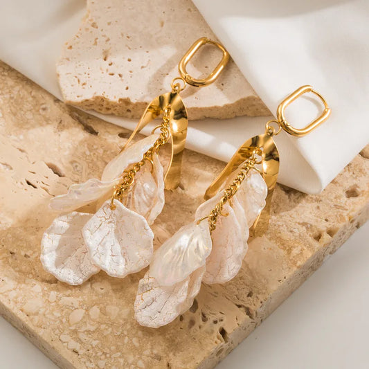 Aretes Concha del mar